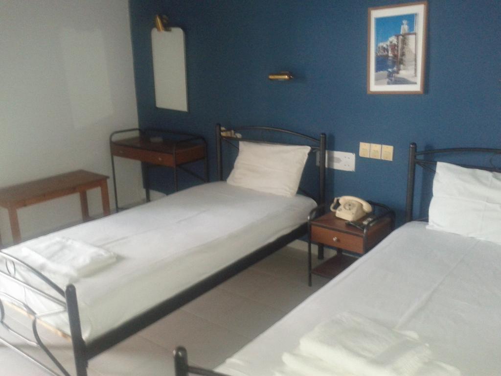 Hotel Tainaro لوترا إديبسو الغرفة الصورة